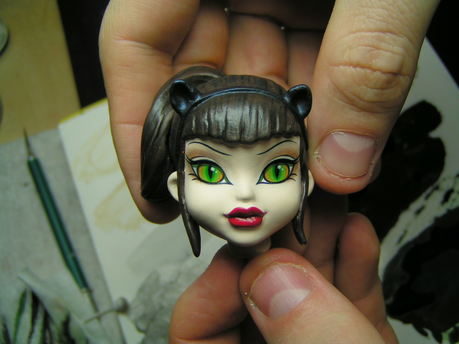 @nuthman's grubby fingers holding a paint master I was working on