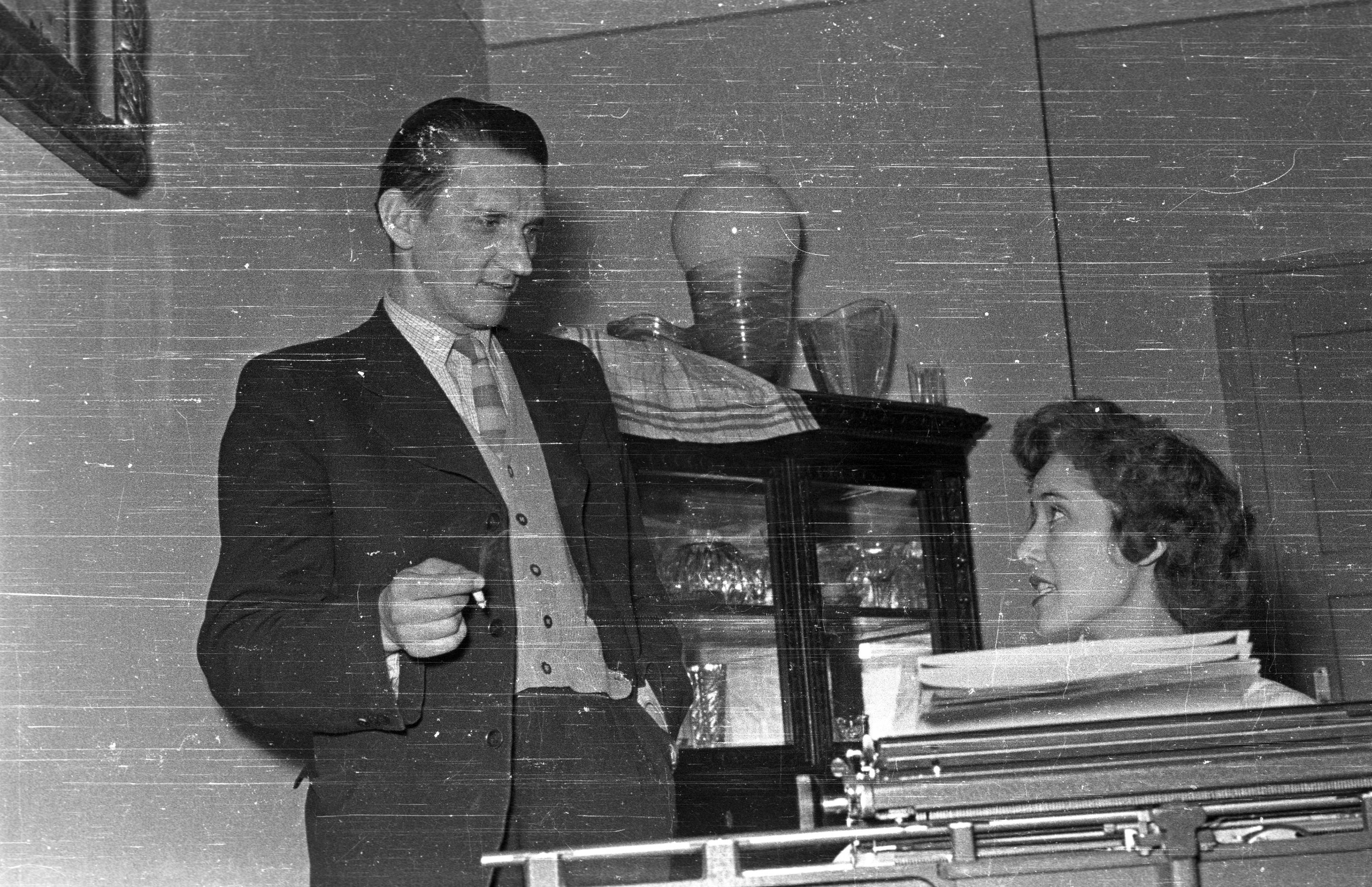 Workplace,_typist,_typewriter,_man,_smoking_Fortepan_93824 3.0.jpg