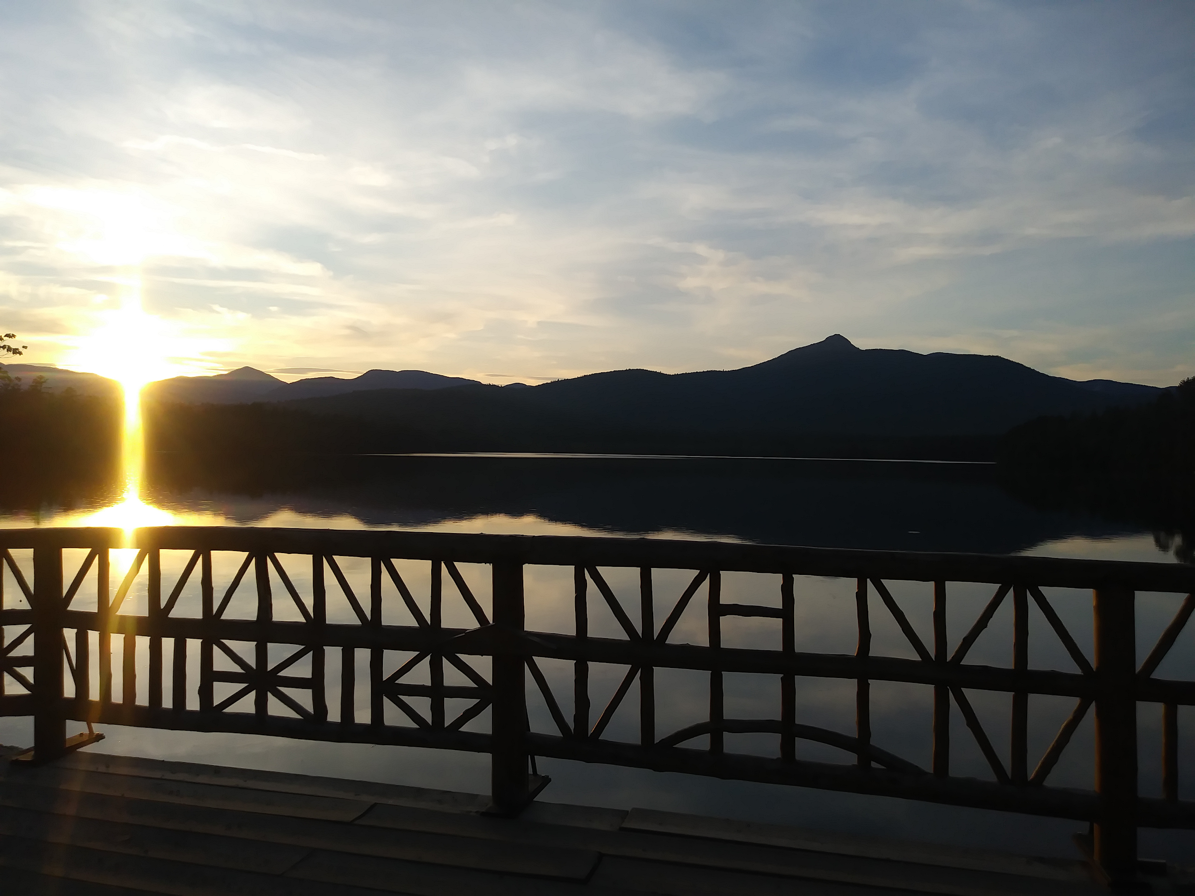 bridge sunset white mountains.png