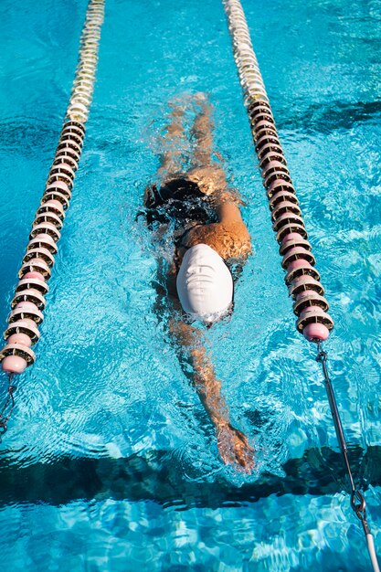 young-woman-enjoying-swimming-pool_23-2148700002.jpg