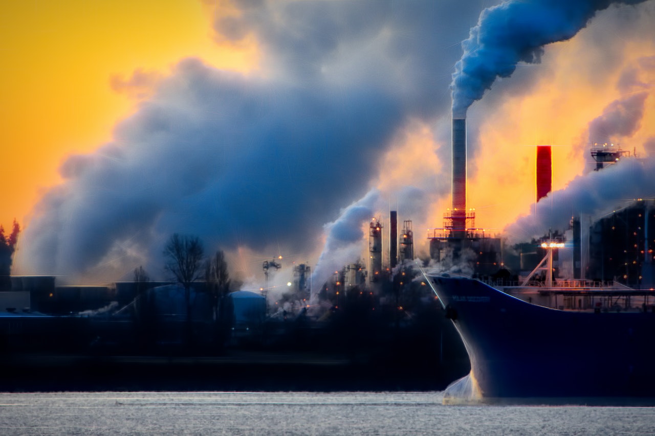 Industrial smoke over dock : Source: Pexels