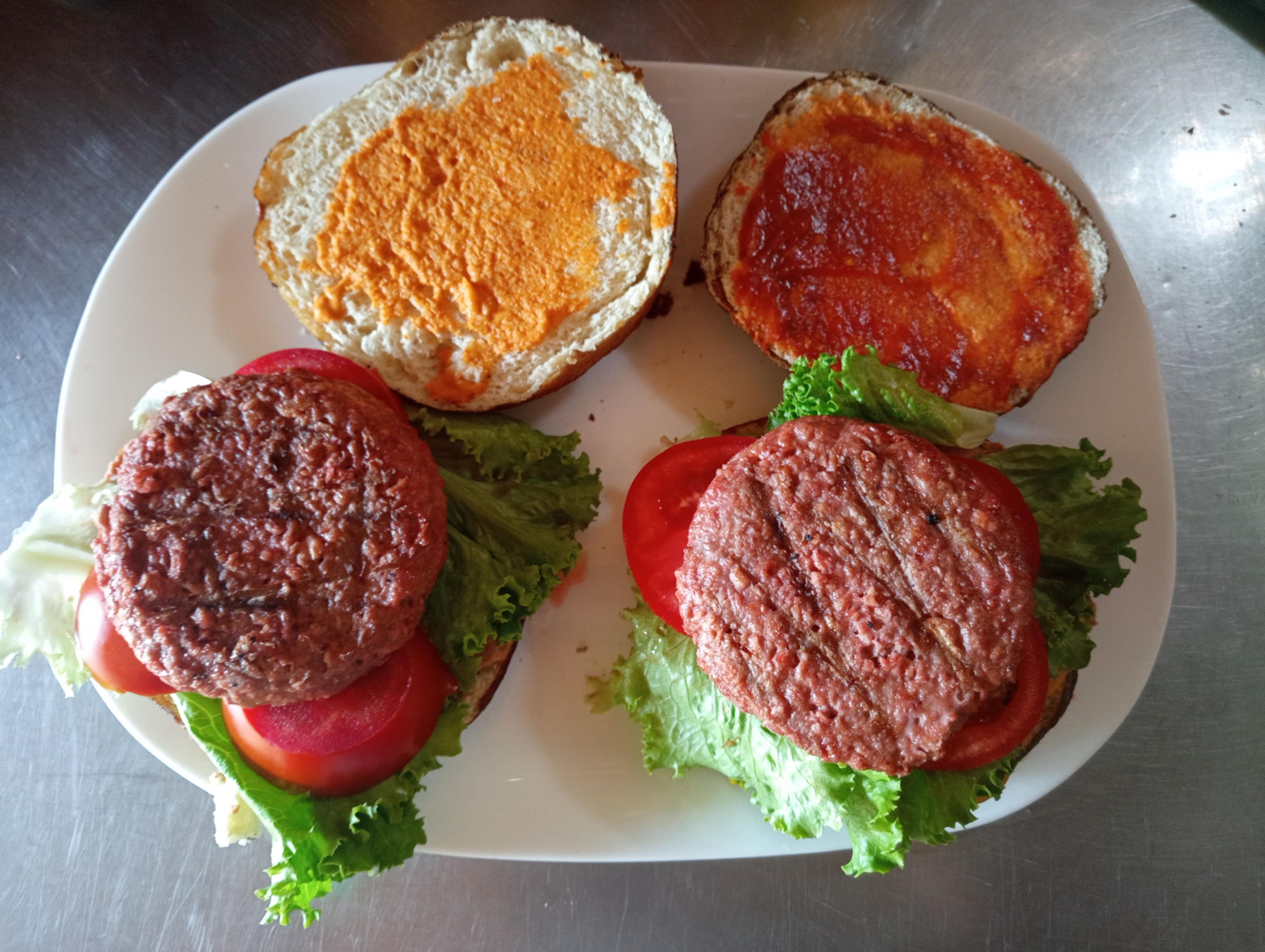 One for my brother, one for me. I love Beyond Meat burger patties. This time, I served it with home-made chili sauce, and a Dill-Pickle-Paprika-Onion spread I make. Perfect!