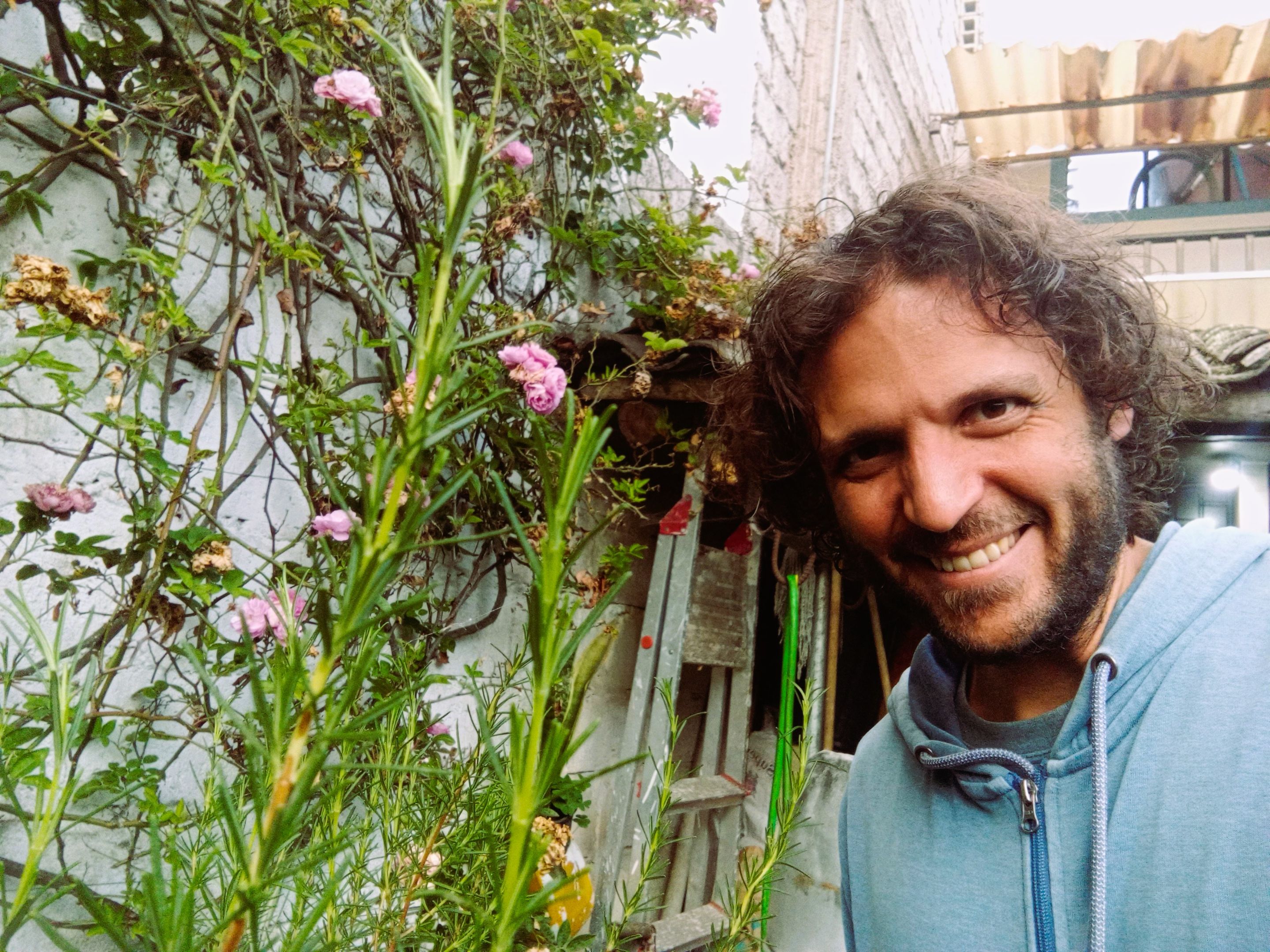 Anyway, I did take the picture of Rose (in the background, a climbing one), then me, then the Rosemary.
