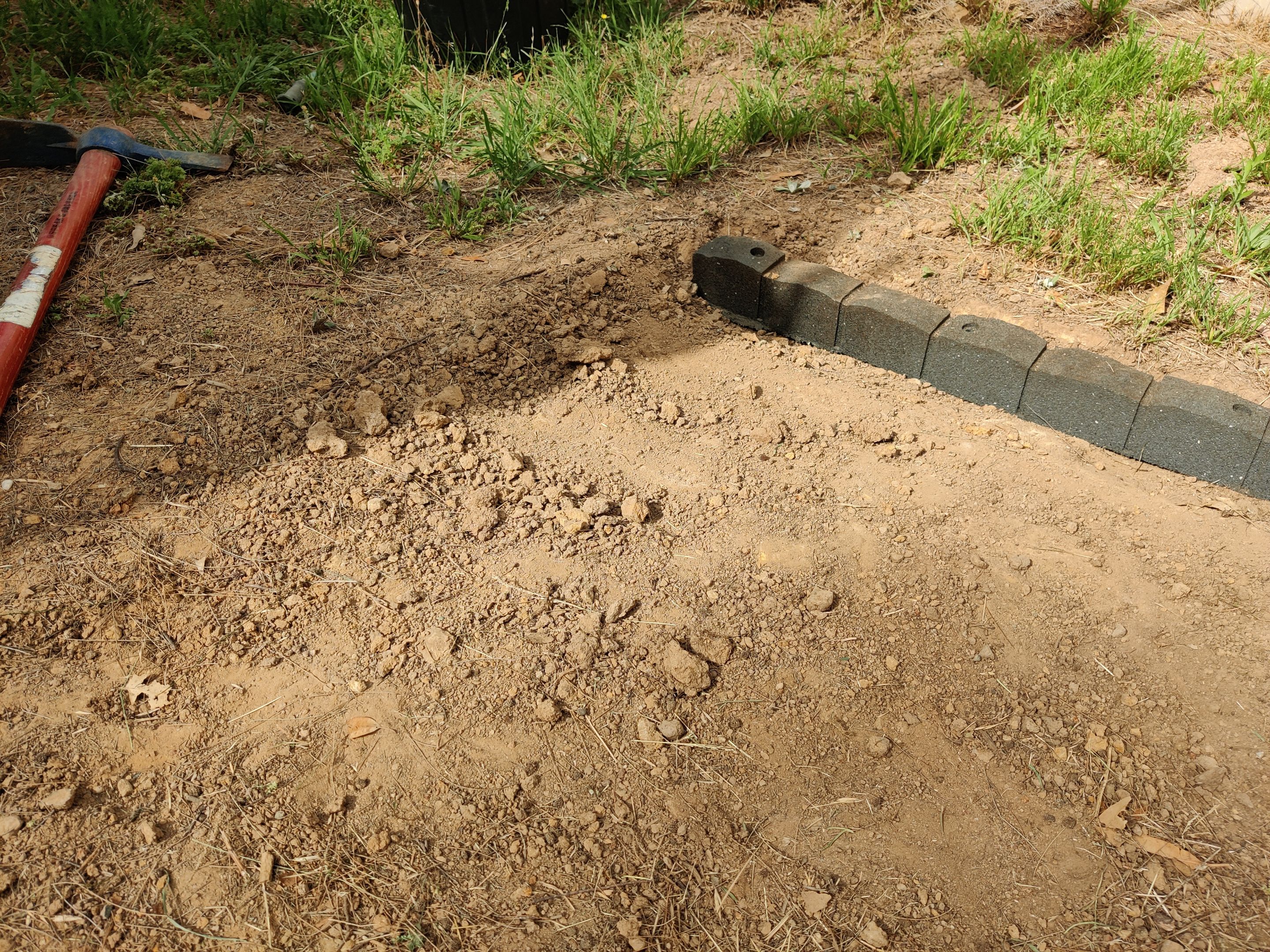 Weeding and Prepping the Next Playarea.jpg