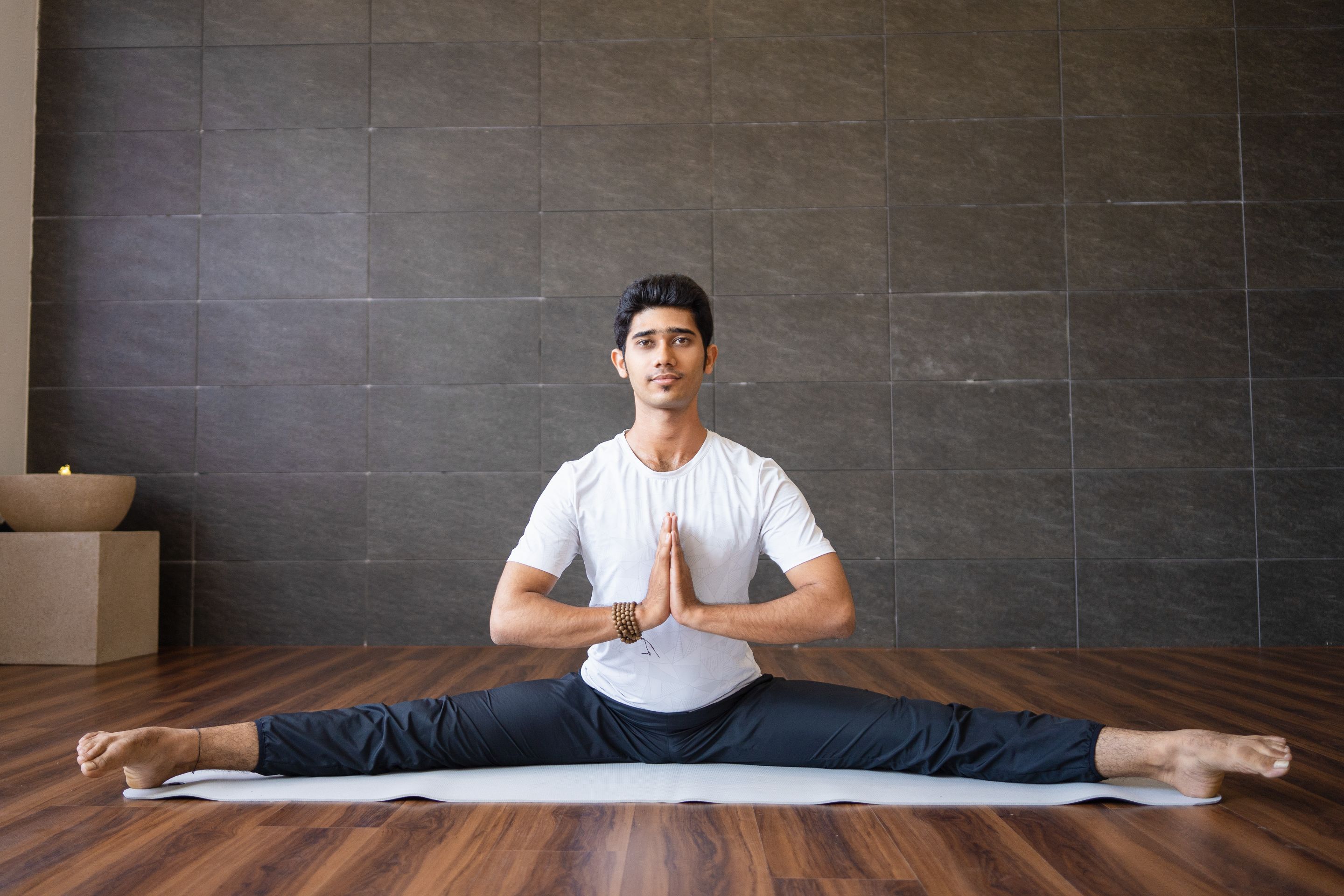young-indian-yogi-doing-splits-gym.jpg