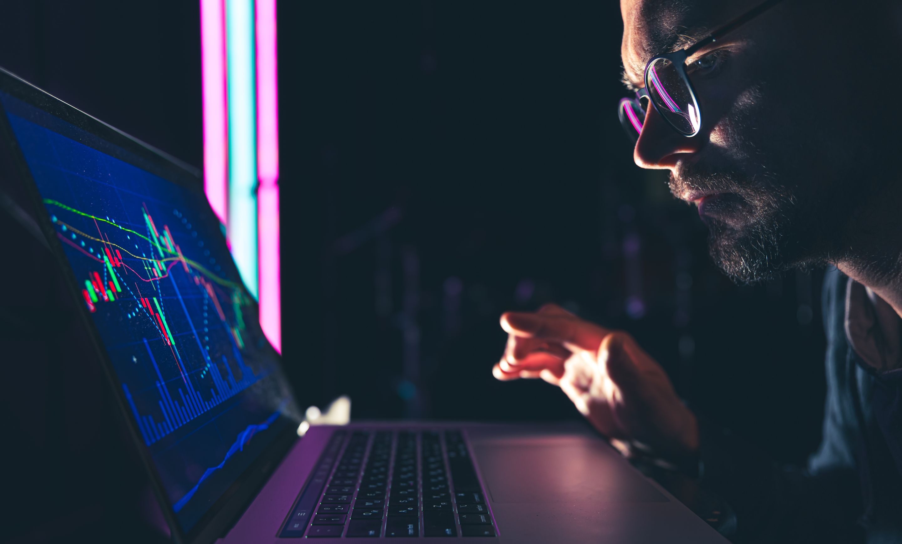man-analyzing-stock-market-charts-financial-data-electronic-board.jpg