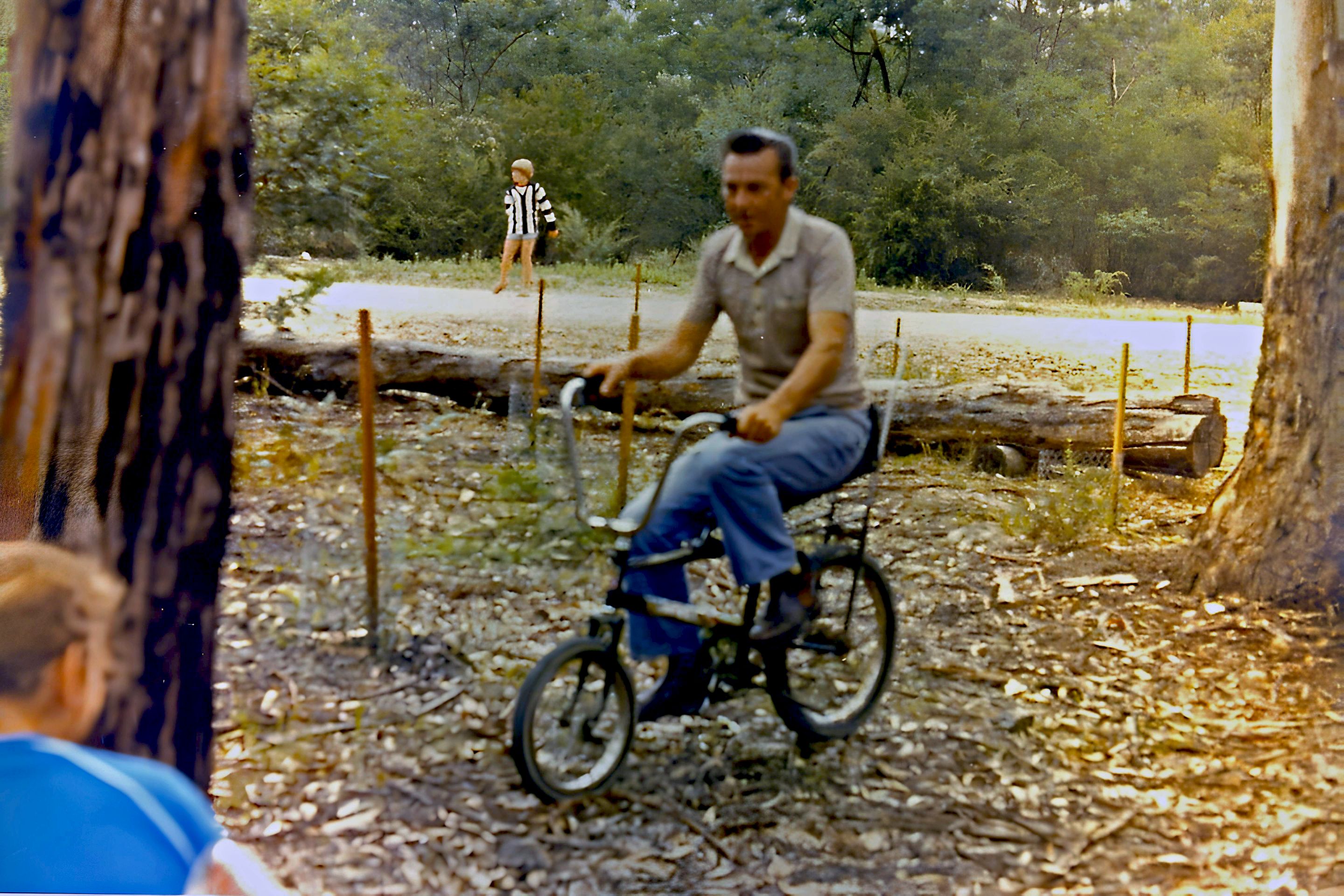 DAD RIDING BARLEYS DOUCHES BIKE AT BOURNDA.png