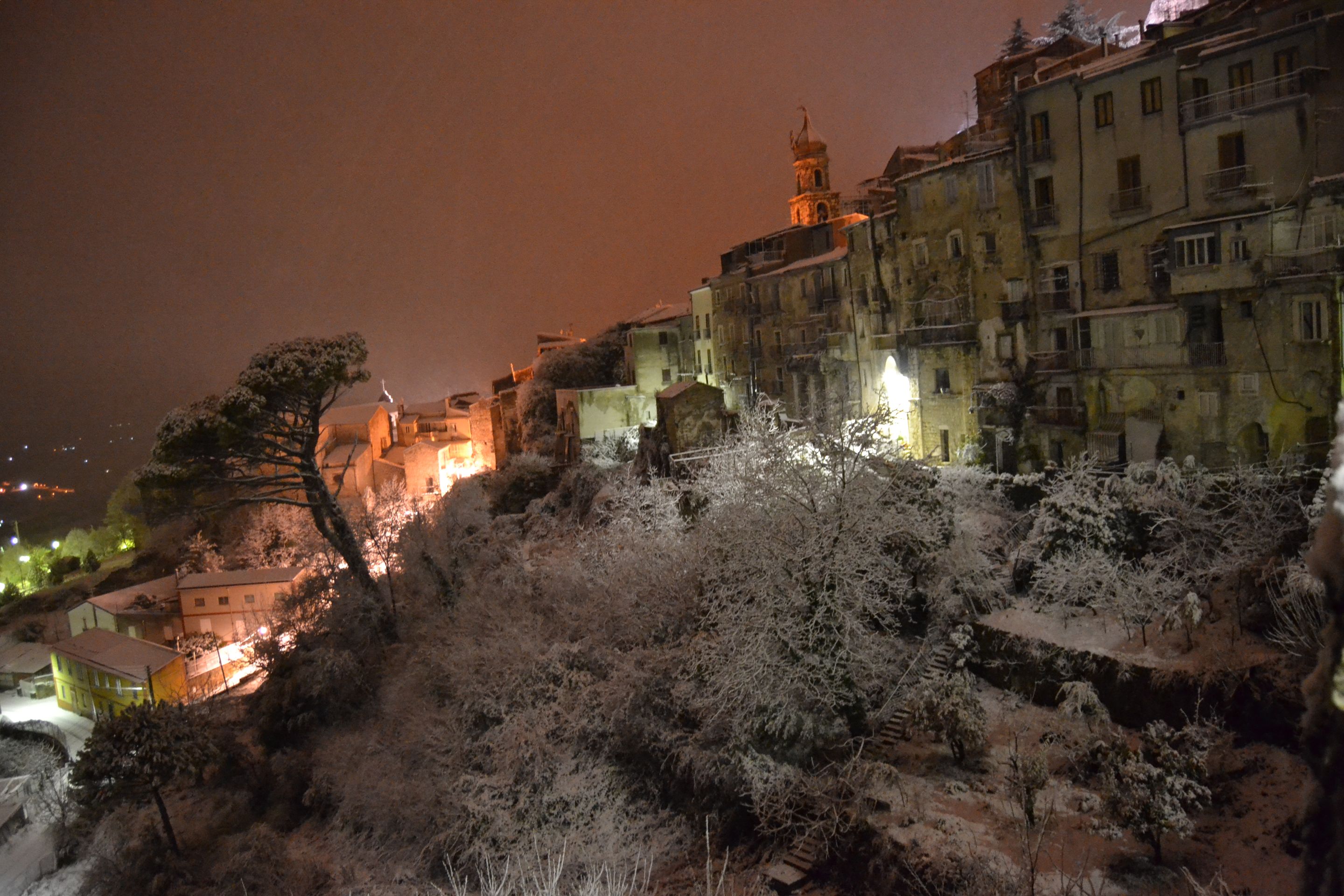 view of Via Degli Orti in the snow at  night.JPG