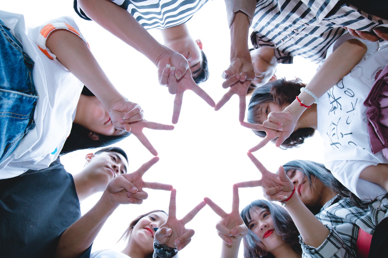 groupofpeopleformingstarusingtheirhands1116302.jpg