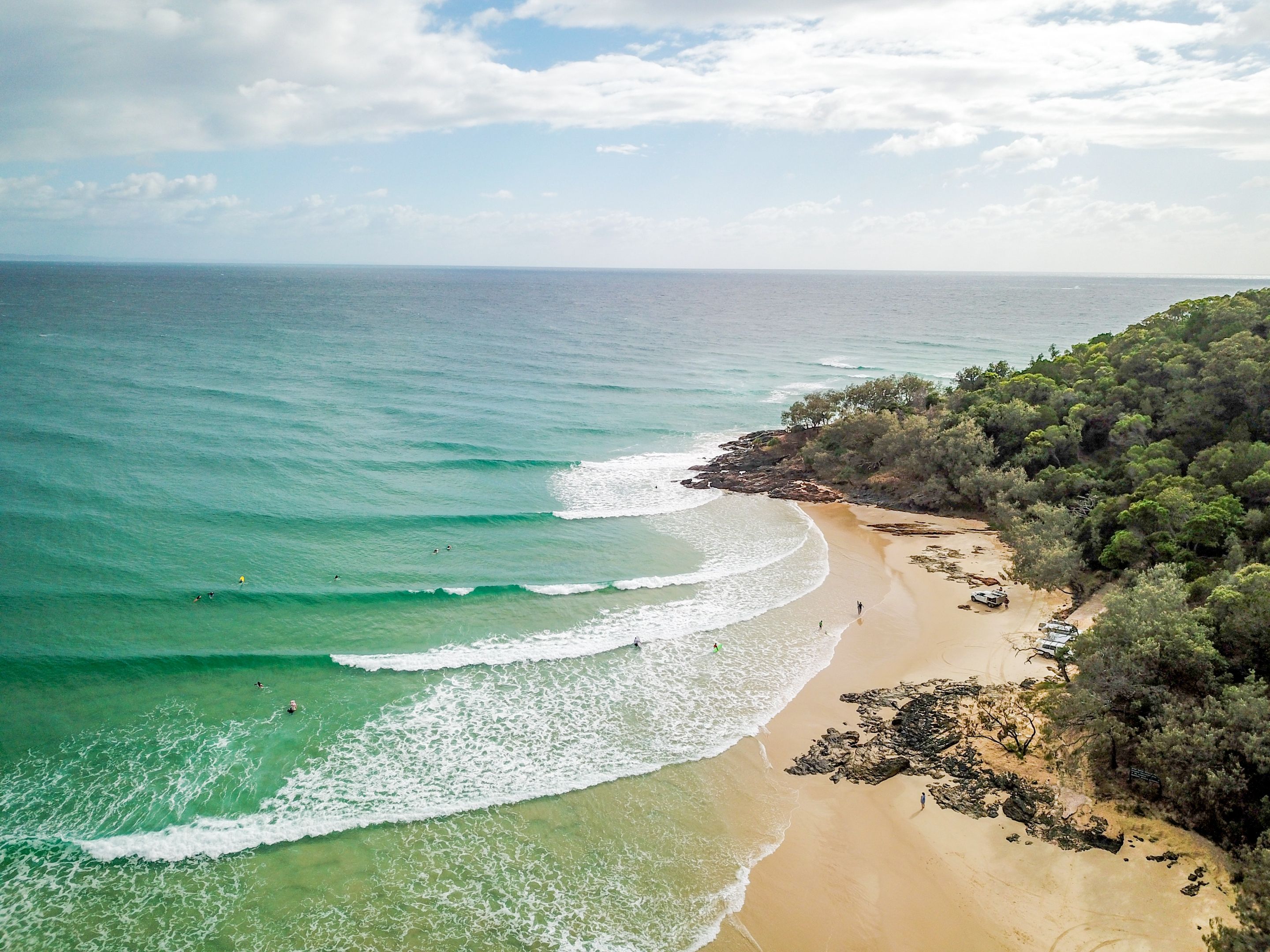 Rainbow beach, Australia - example of a point break. Photo bay Daniel Jurin - Pexels.jpg