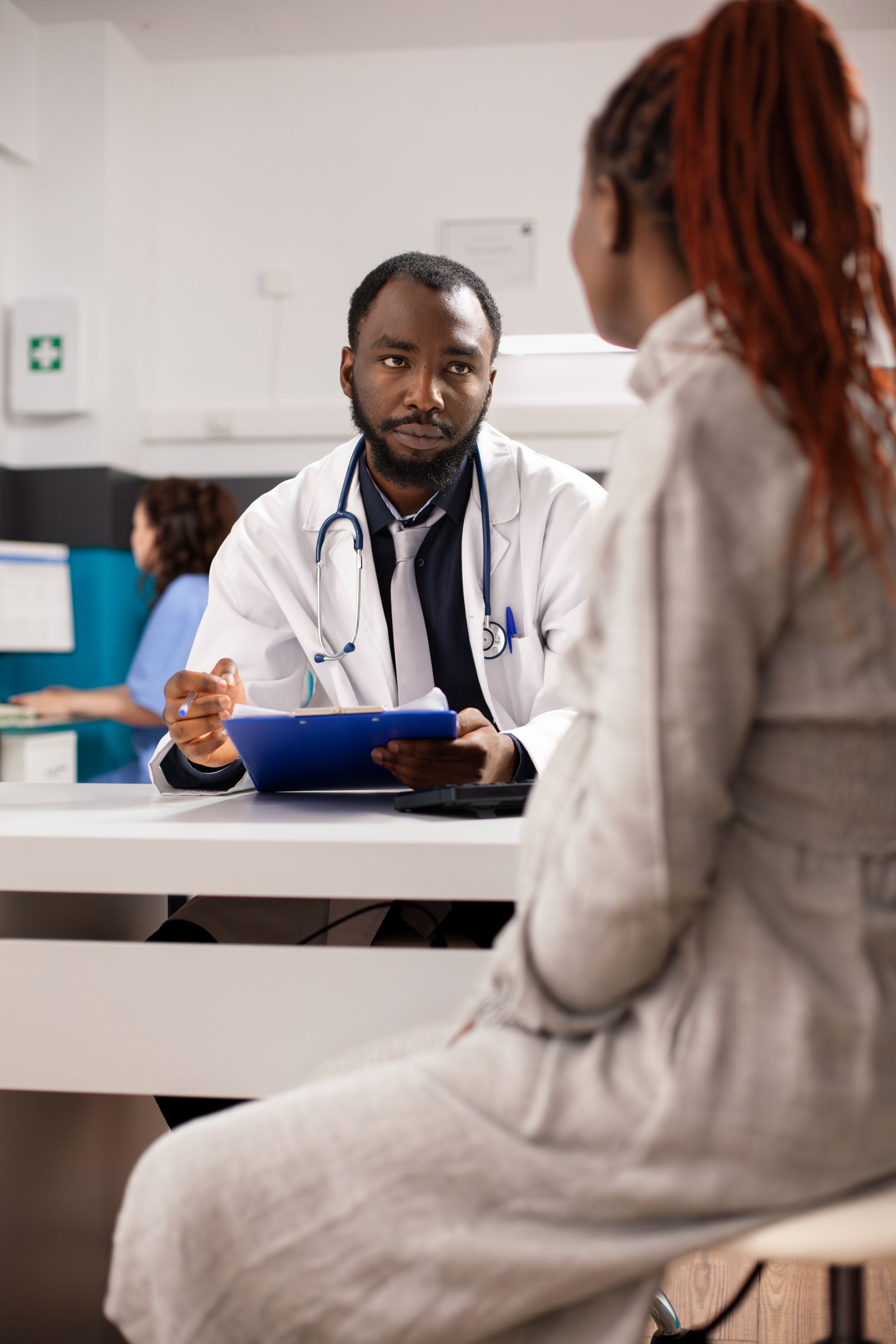 black-woman-receiving-prenatal-care.jpg