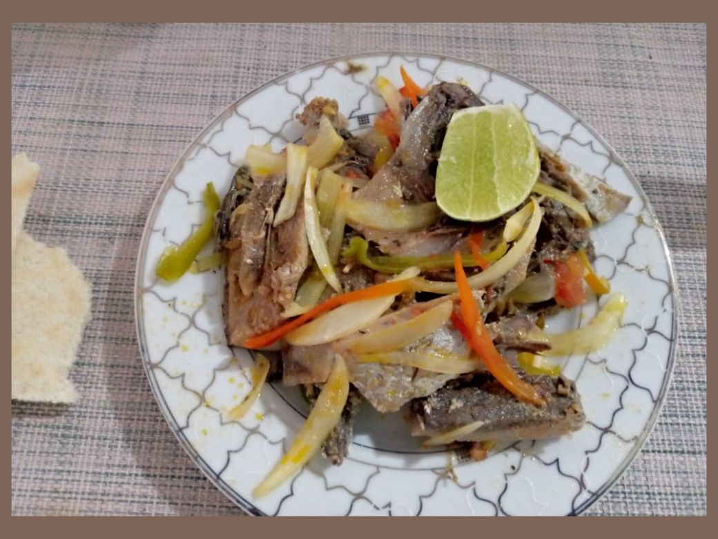 Salted fish in sautéed vegetables