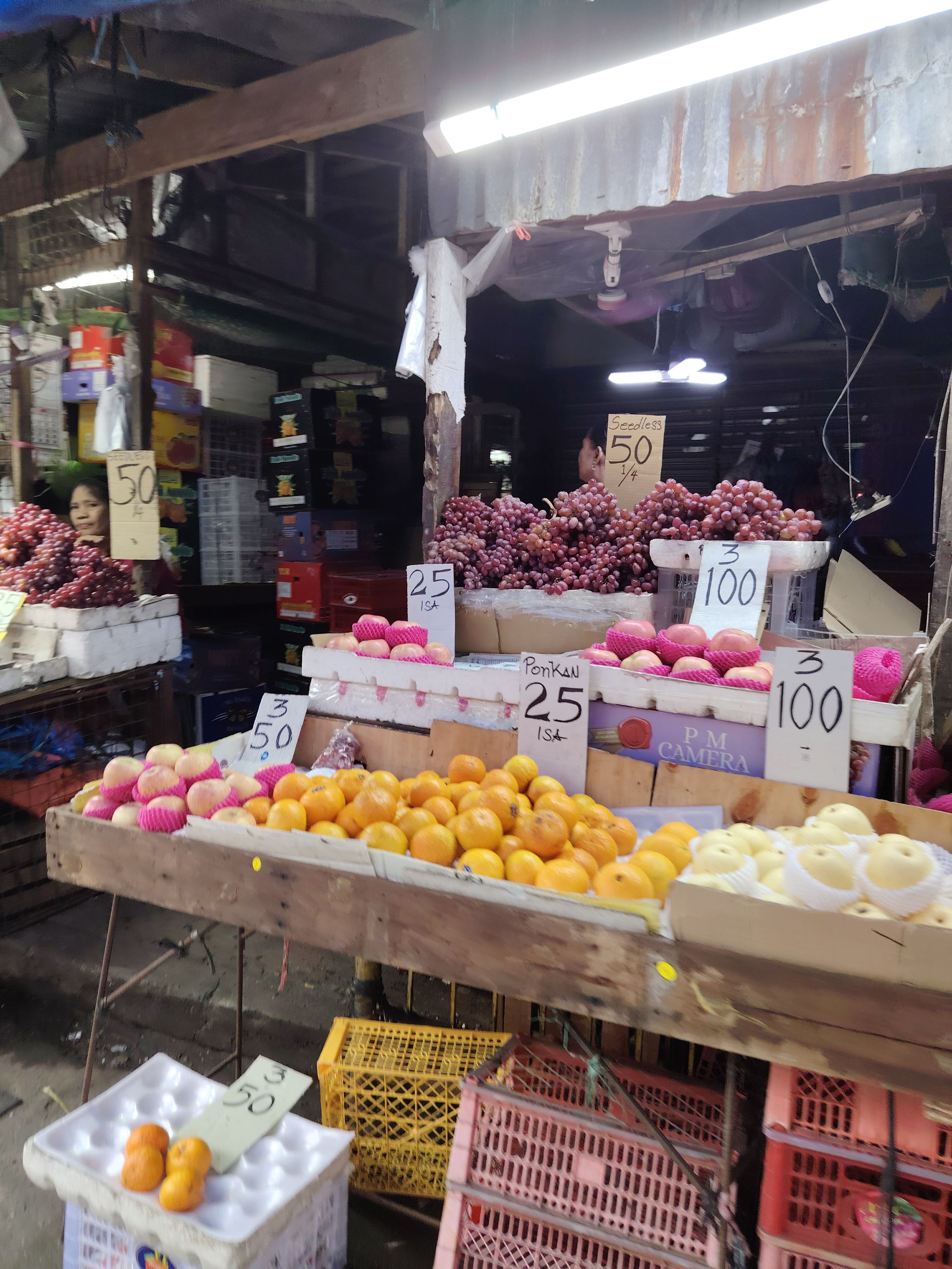 Fruits and grapes for sale