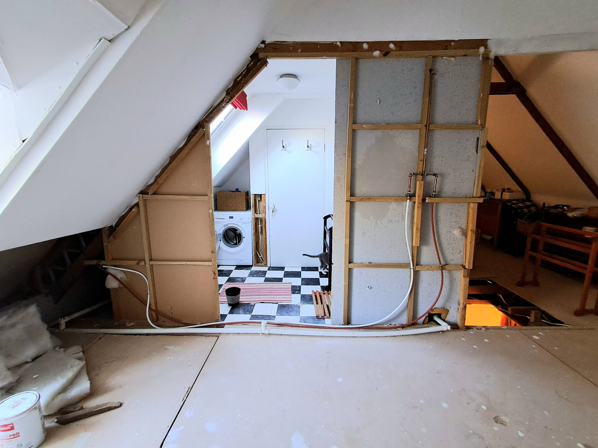 Where the new (existing) door will be fitted. Plumbing to be re-routed.