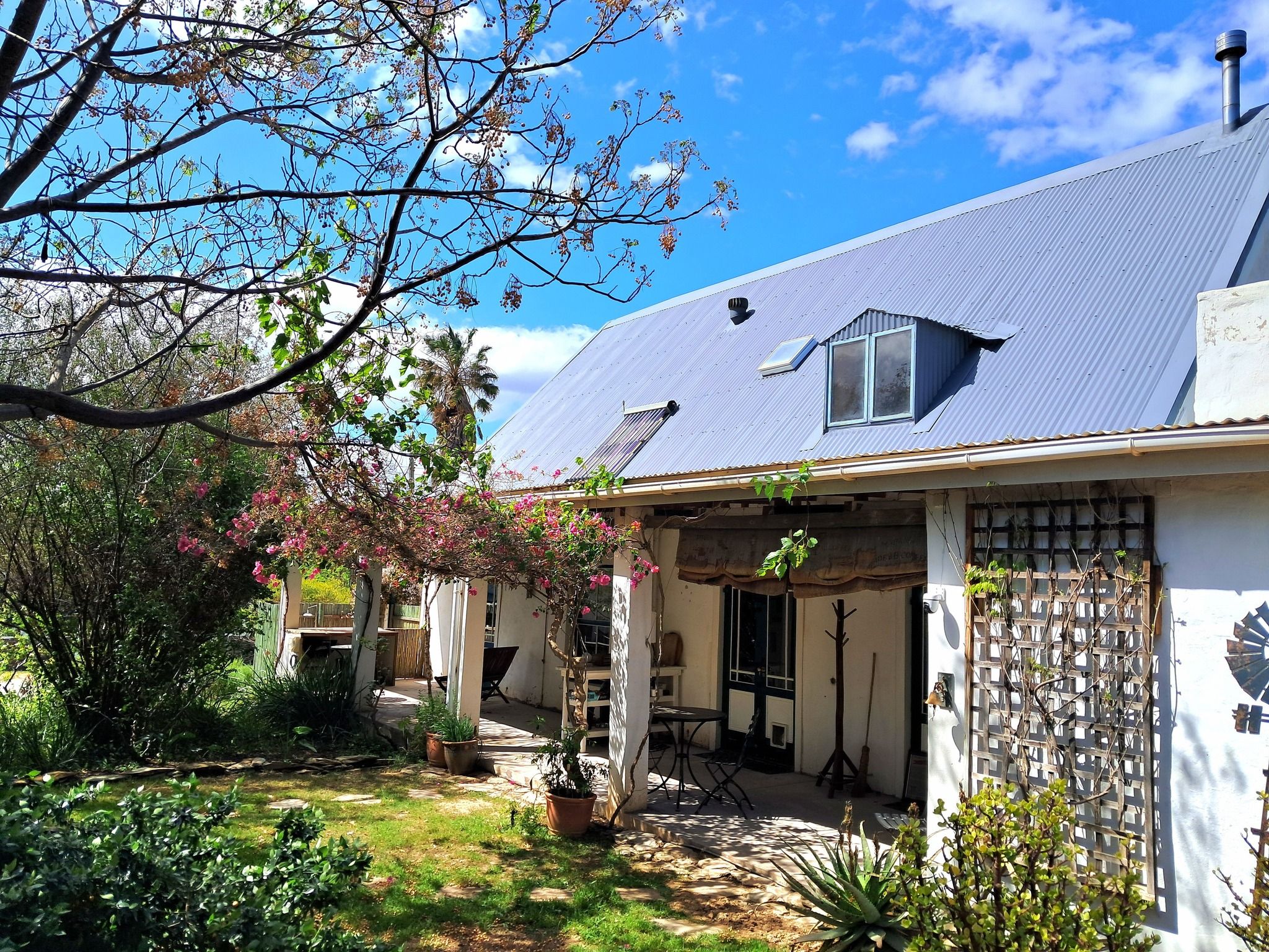 Pretty painted roof and new window overlooking the garden