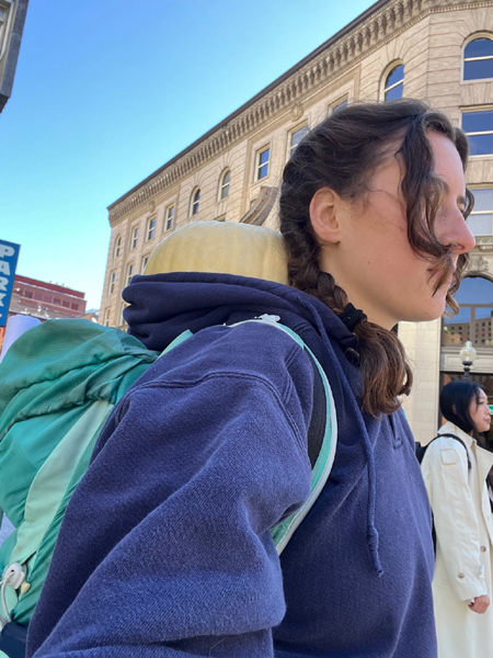 Carina carrying pumpkin to Boston crop Oct 2025.jpg