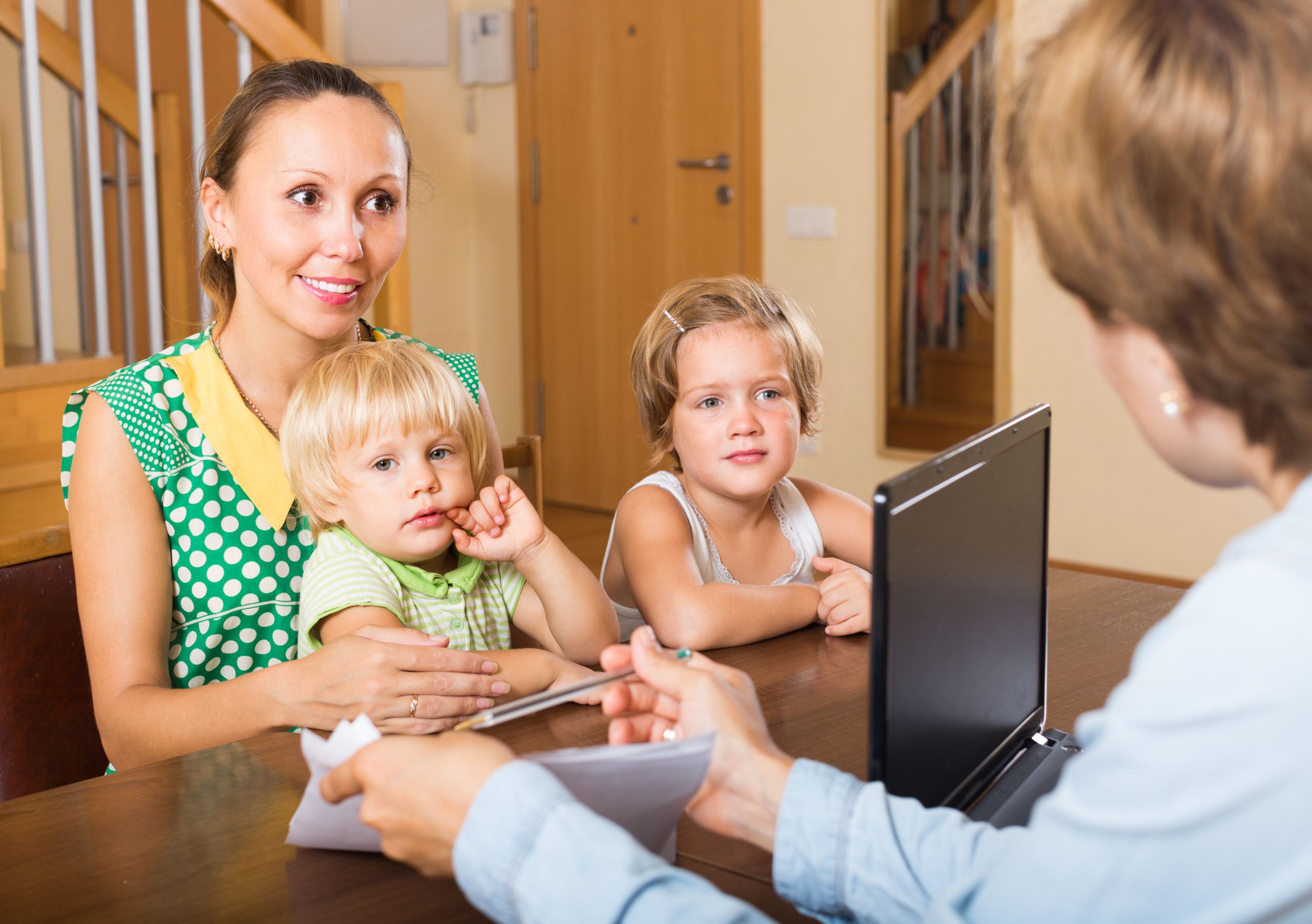 agent-consulting-woman-with-kids.jpg/