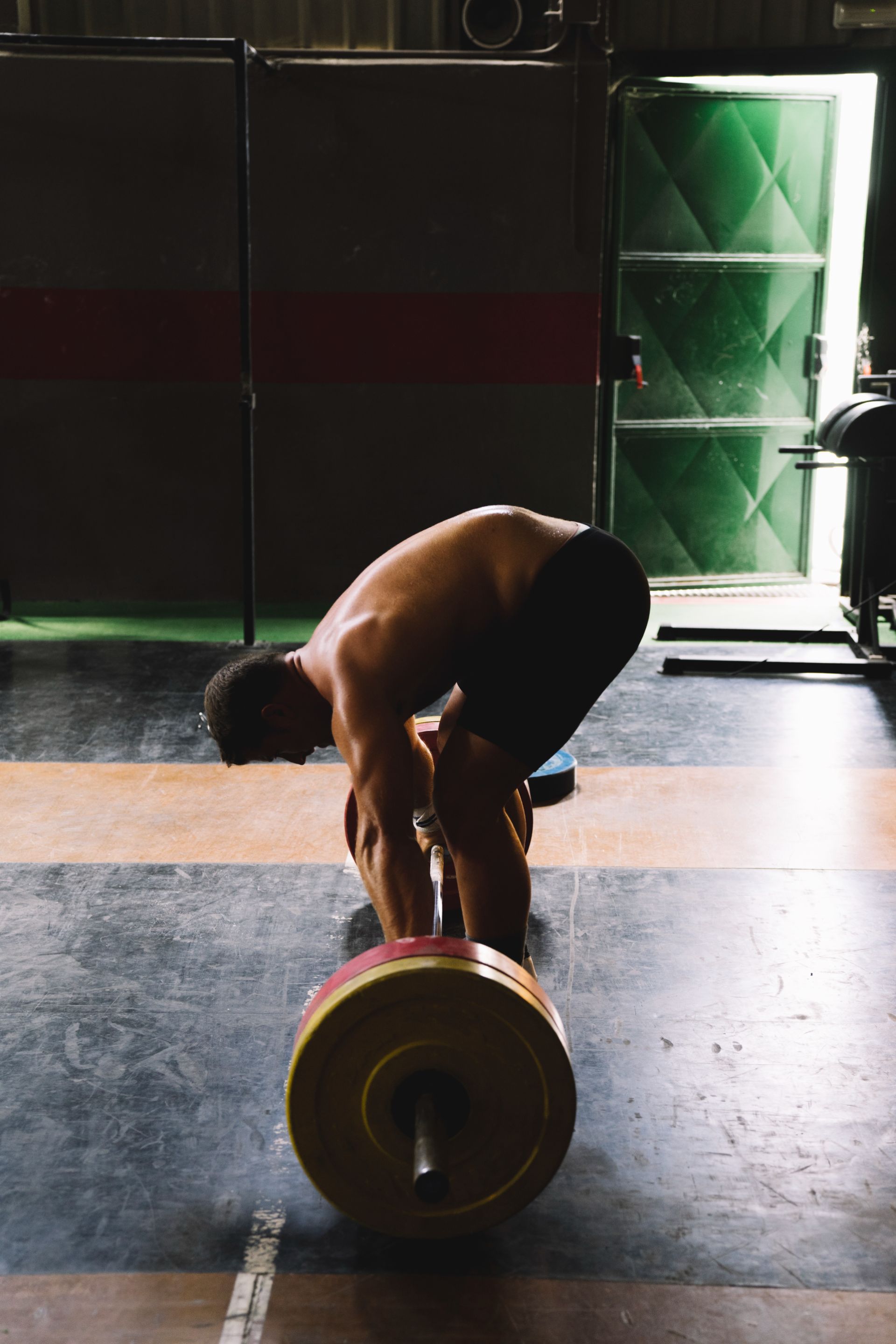 side-view-man-with-barbell.jpg