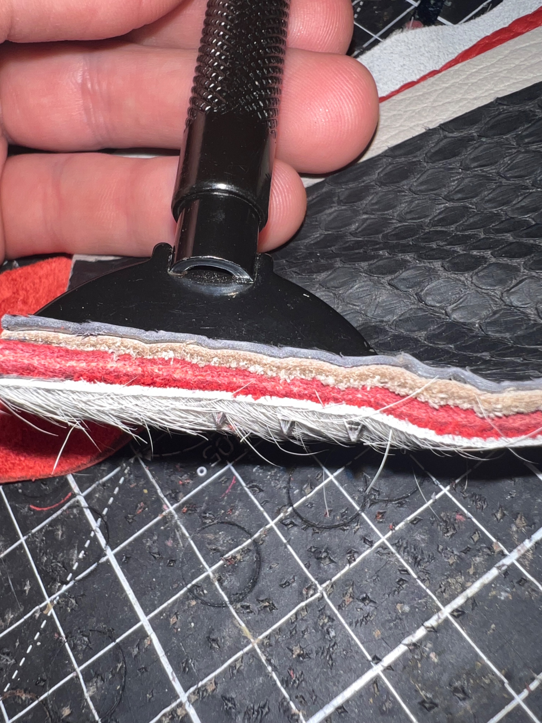 "The Leather Sandwich having quite of a resistance when comes to poking the holes"