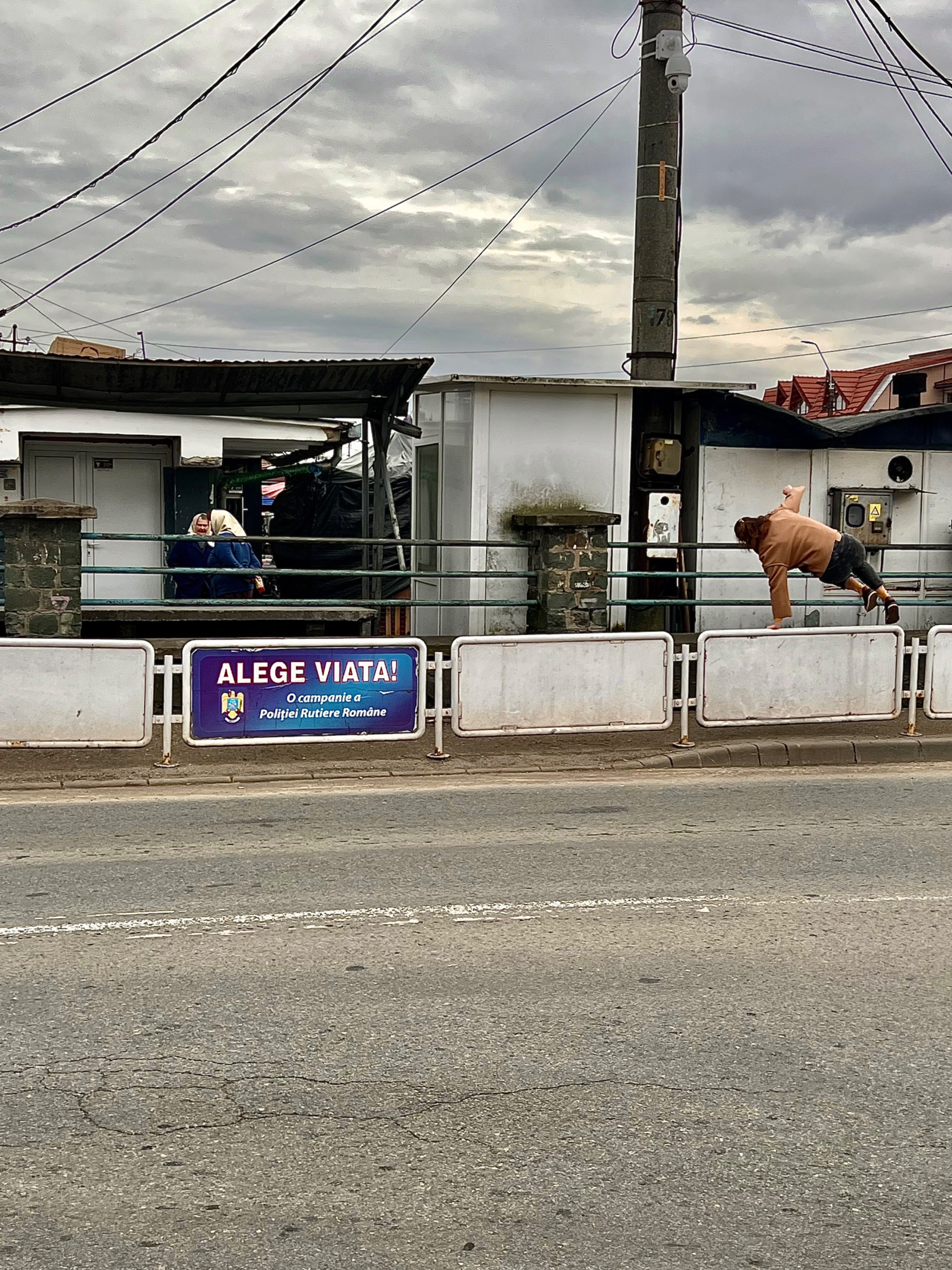 Two old ladies talking in the market stall, an add from the police department on which is saying: “choose life”,  & a brave subject crossing the street (illegally) where was not zebra, all the elements, giving my friend courage to cross into the life of her subjects.