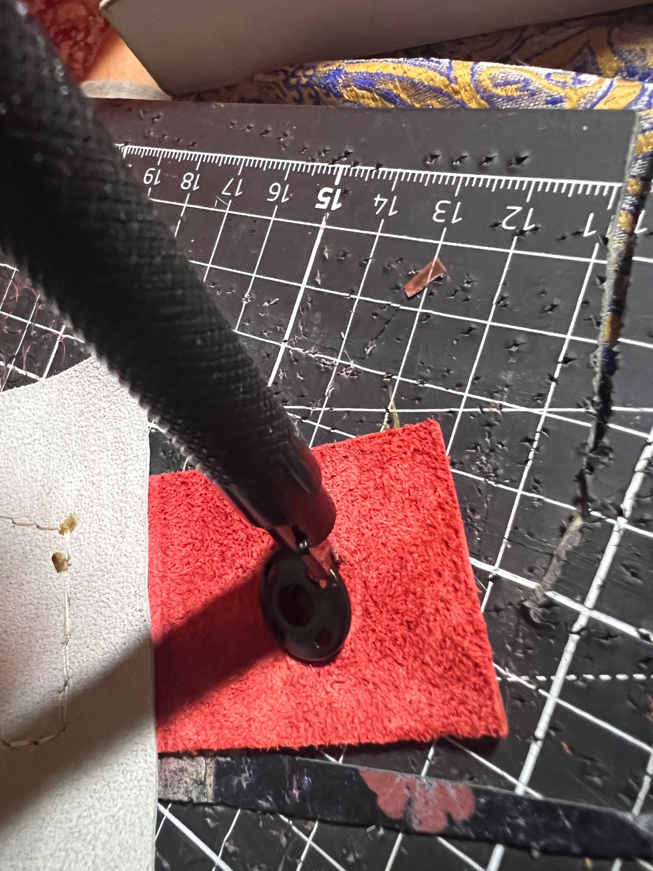 Poking the holes of the final part of the closing system