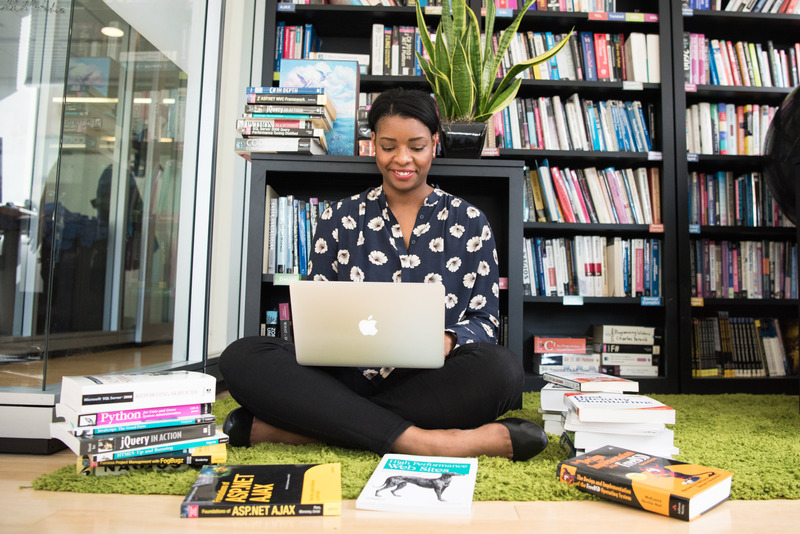Canva Woman in Black Shirt Using Macbook.jpg