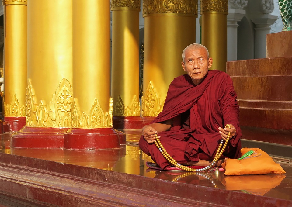 Buddhist monk w rosary pixa.jpg