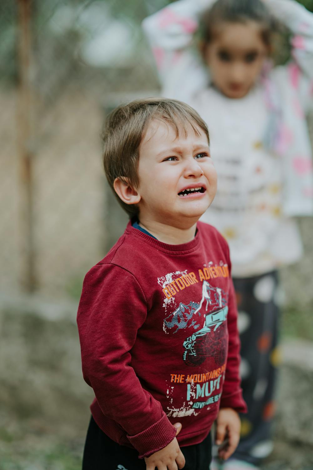 free-photo-of-young-child-crying-outdoors-in-casual-outfit.jpeg