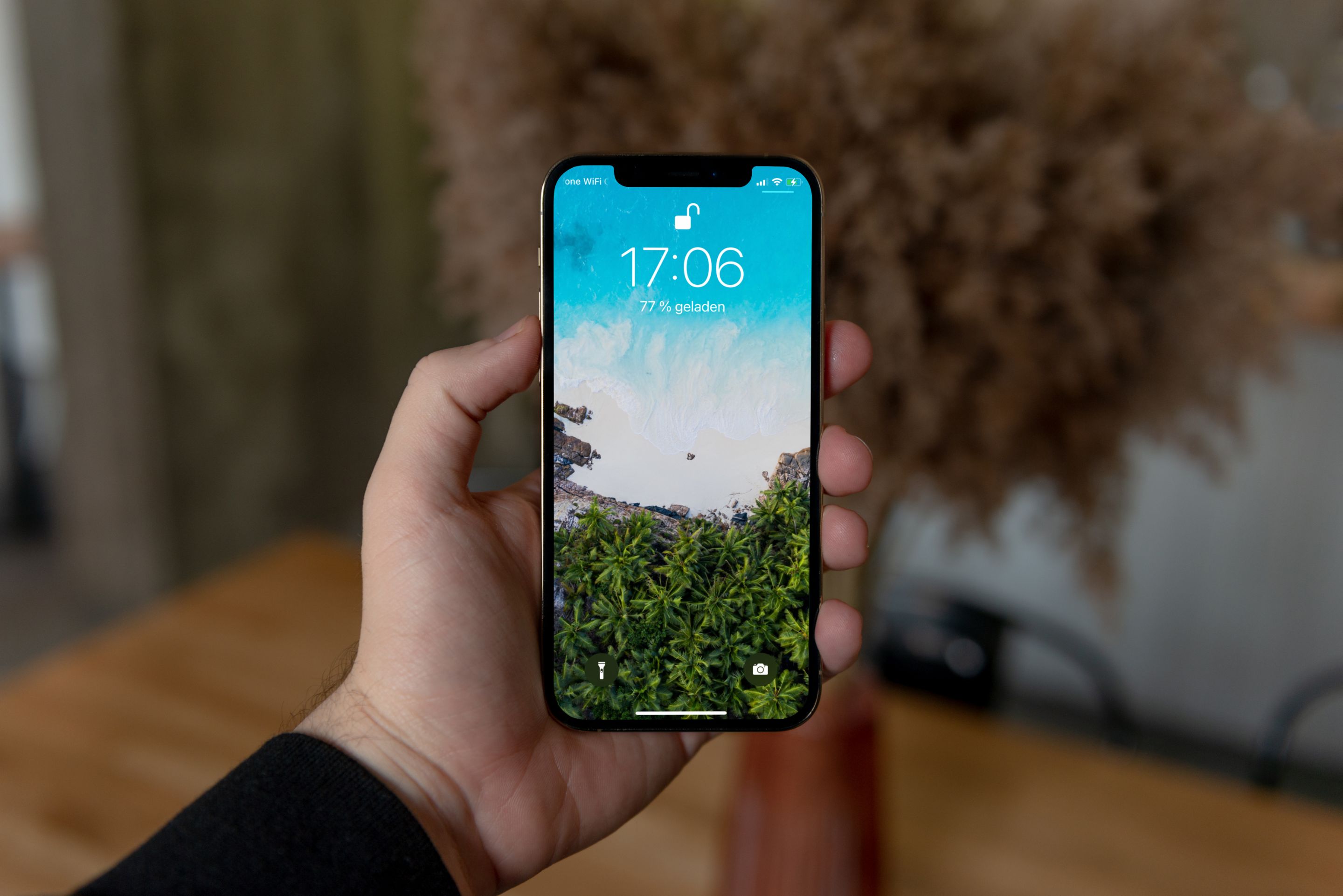 iPhone 12 Pro Mockup in Mans Hand.jpg