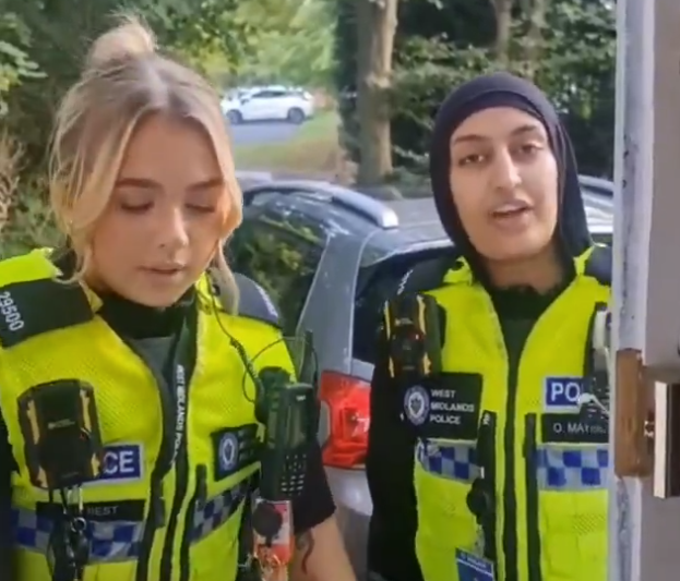 cops at the door.png