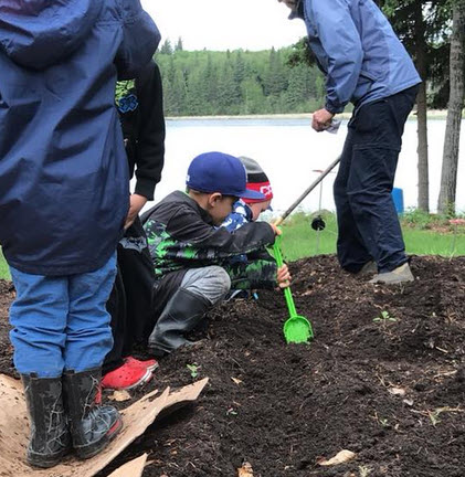 digging in the garden wth Pre-K kids.jpg