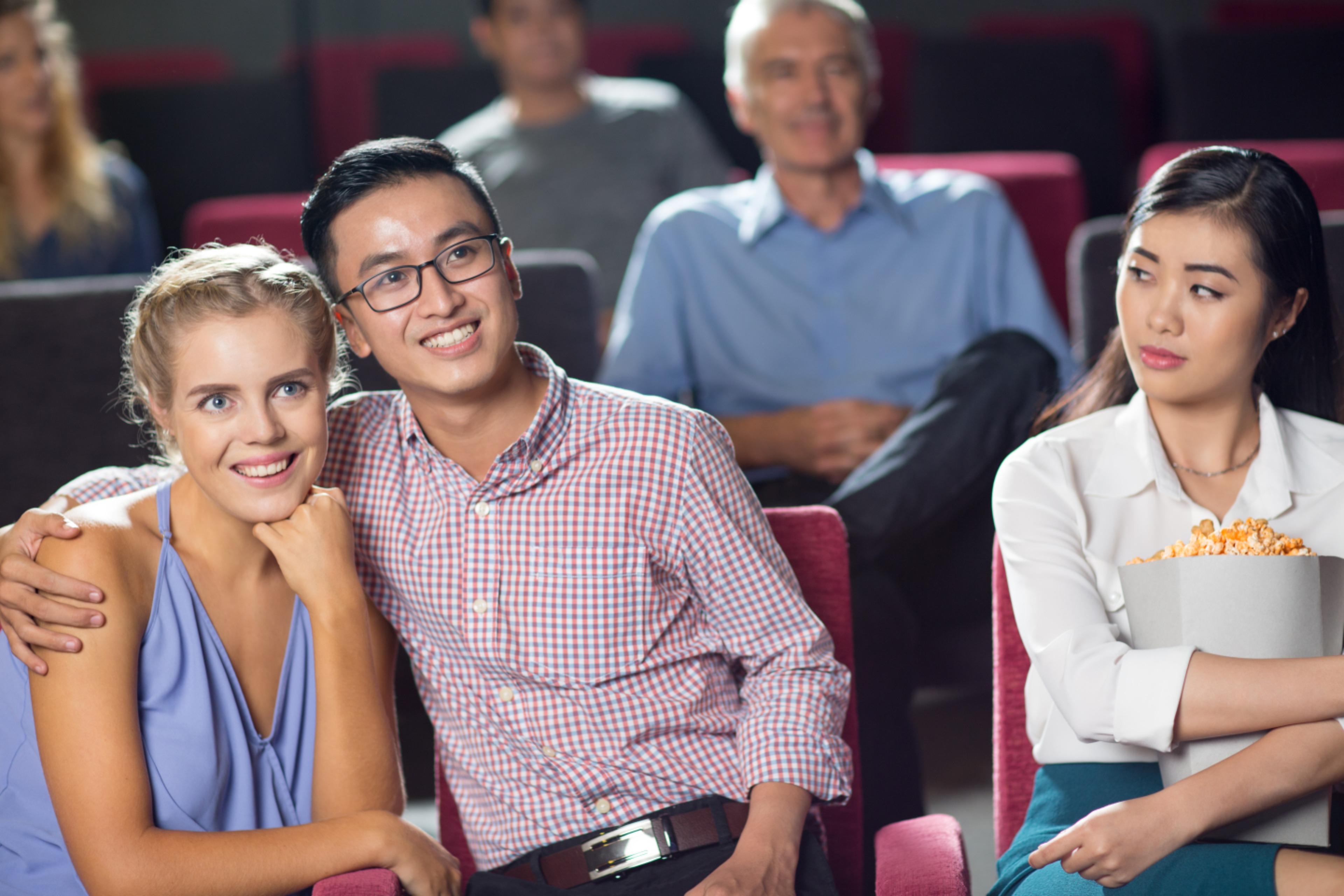 happycouplewatchingmoviegirllookingthem.jpg