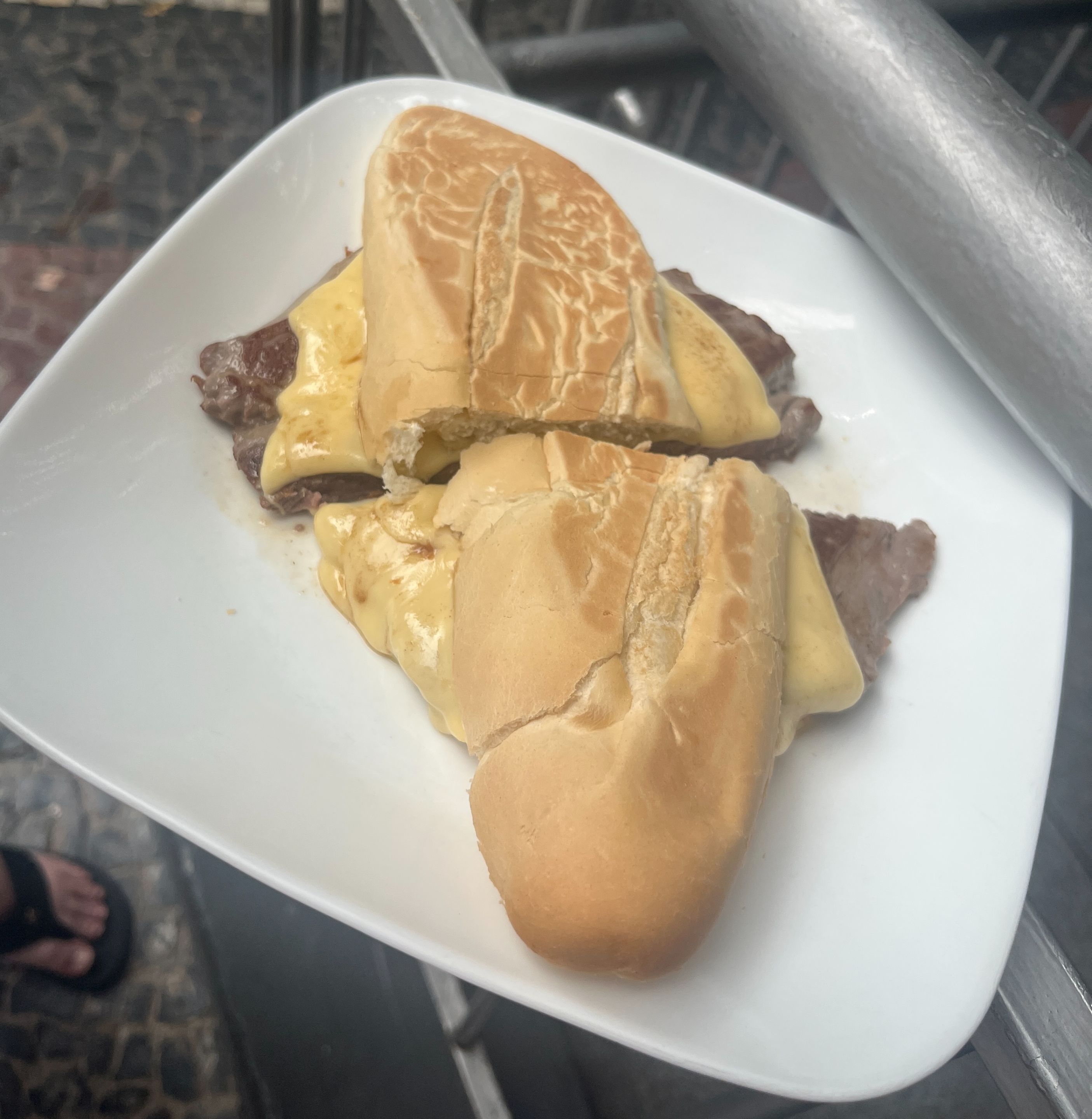a sirloin steak sandwich with cheese, using high quality steak