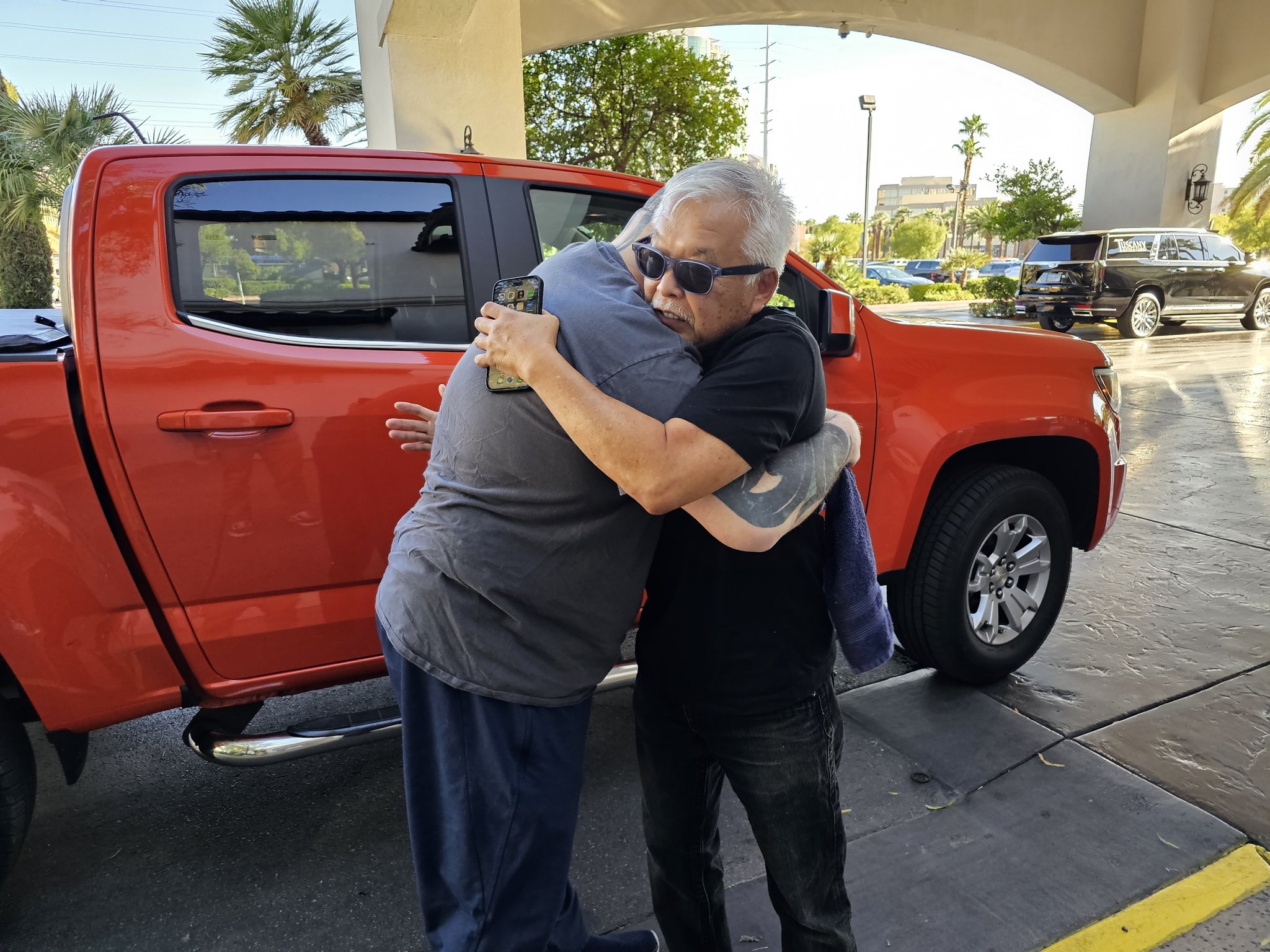 perry sonny embrace.jpg
